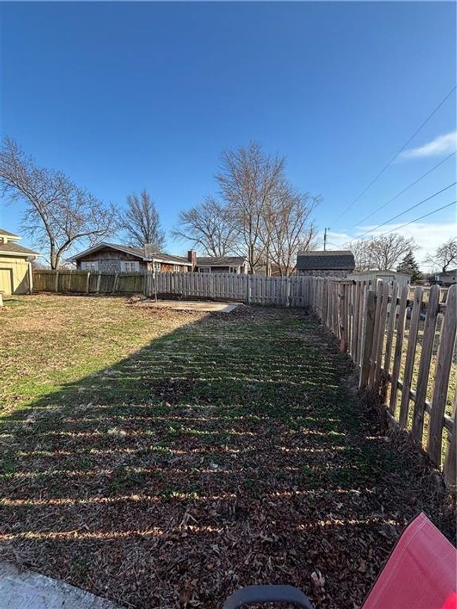 View of yard with a fenced backyard | Image 32