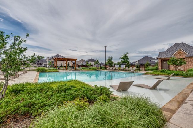 Community pool with a gazebo and a patio area | Image 29