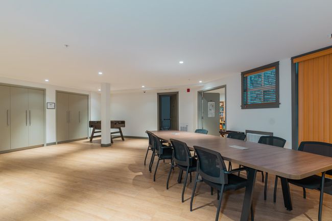 Dining area featuring light wood finished floors and recessed lighting | Image 39