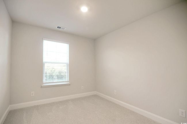Empty room with carpet floors | Image 26