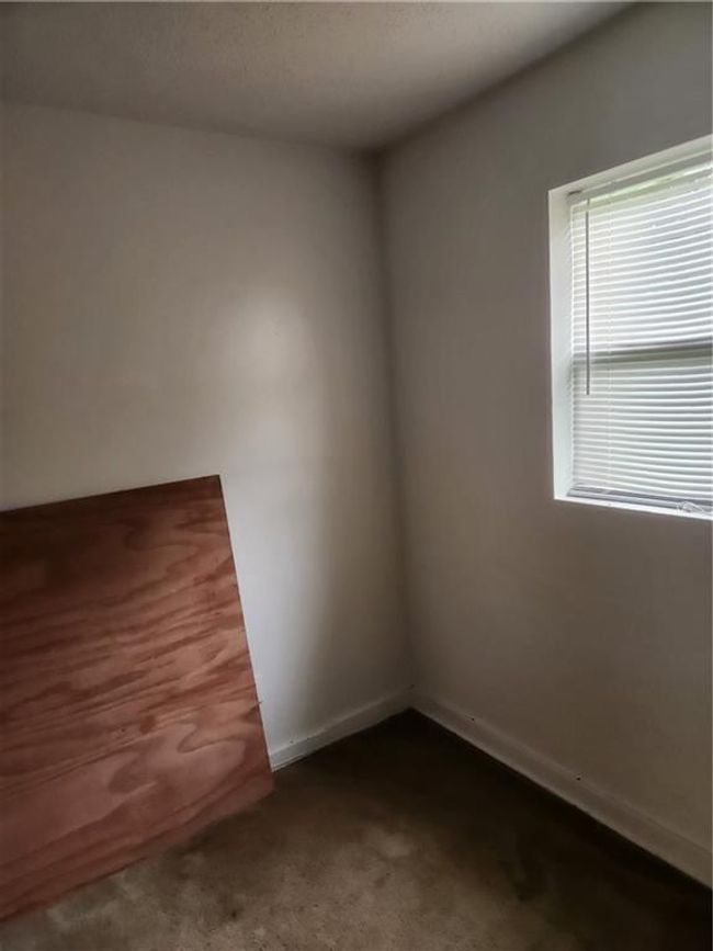 Unfurnished room featuring carpet floors | Image 15