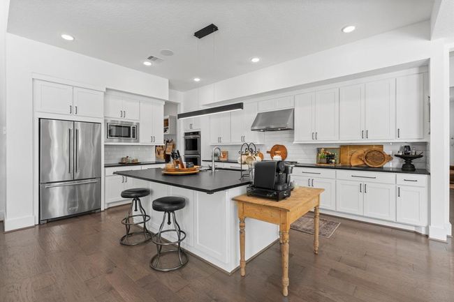 Sleek and modern kitchen with custom hardware | Image 17