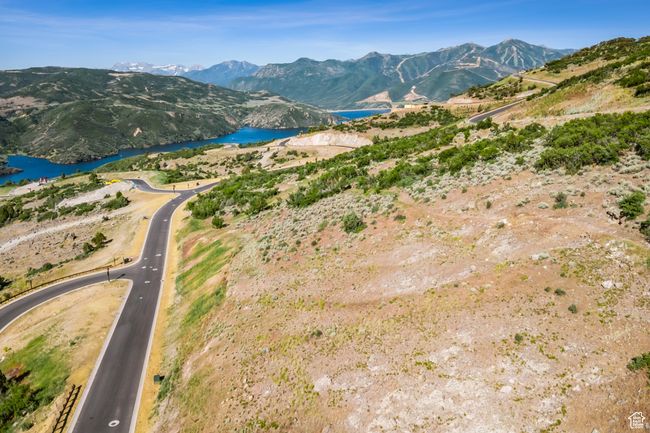 Mountain view featuring a large body of water | Image 12