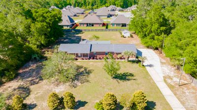 3178 Lake Suzanne Dr, House other with 4 bedrooms, 3 bathrooms and 2 parking in Cantonment FL | Image 3