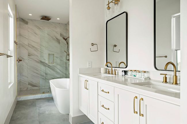 Full bath featuring recessed lighting, a shower stall, baseboards, and a sink | Image 19