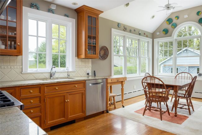 Kitchen with plenty of natural light , cherry cabinets , stainless appliances | Image 11