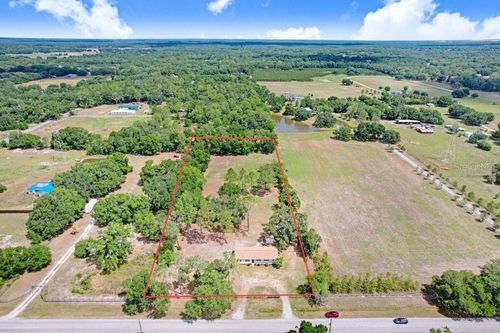 6204 W Knights Griffin Rd, Plant City, FL, 33565-3718 | Card Image