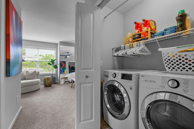 Primary suite features laundry area - no need to haul clothes up/down stairs! | Image 26