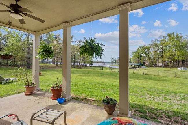 Picturesque lake view from downstairs porch. | Image 18