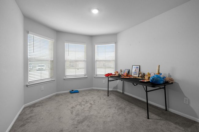 Carpeted office with baseboards | Image 18
