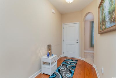 Entryway with light hardwood / wood-style floors | Image 3