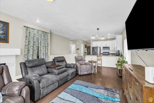 Living room with recessed lighting and wood finished floors | Image 4