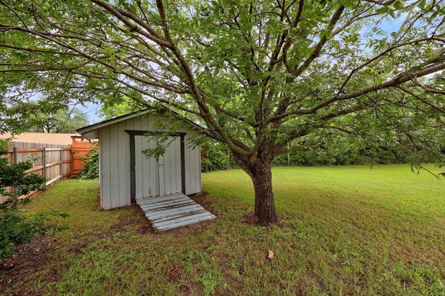 View of yard featuring a storage shed | Image 30
