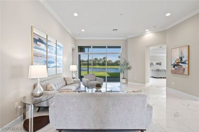 Living room featuring ornamental molding | Image 1