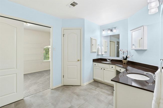 Primary bath has double vanity | Image 13