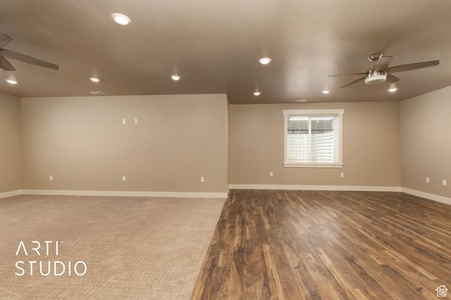 Spare room with a ceiling fan, recessed lighting, and wood finished floors | Image 26