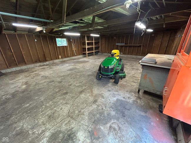 Detached back garage caan hold 4 cars. Or a great workshop or studio, and has lts of outlets! | Image 8