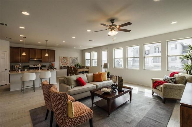 Living area featuring recessed lighting, ceiling fan, and light wood-type flooring | Image 5
