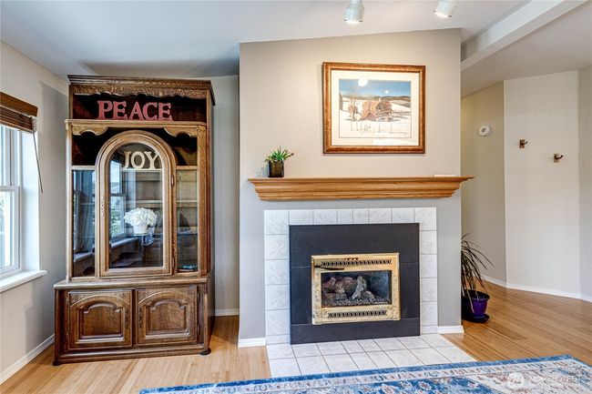 Cozy propane gas fireplace. | Image 12