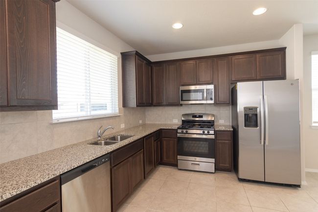 350 Fabion St, House other with 4 bedrooms, 2 bathrooms and 4 parking in Kyle TX | Image 6