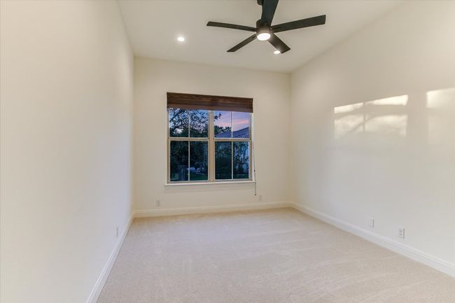 Guest bedroom on main level, freshly painted throughout and new carpet | Image 25