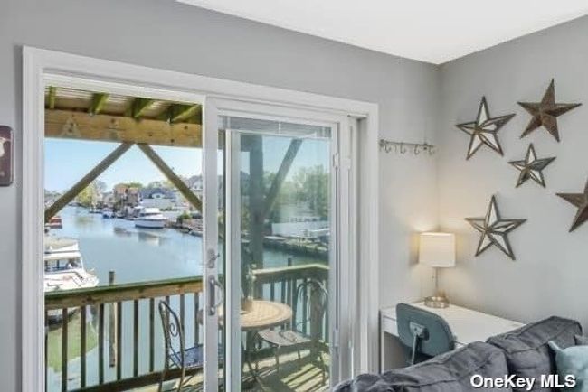 Extended Family Quarters w/Sliding Door Entrance & Balcony w/Waterfront Views! | Image 25