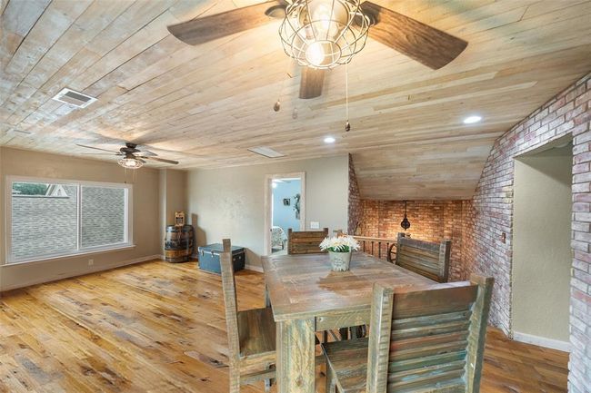 A spacious game room provides limitless opportunities for entertainment. | Image 34