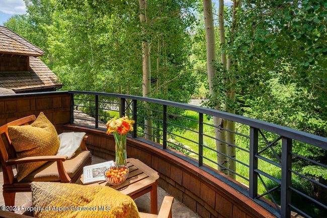 Sun all day on this private balcony which overlooks the river. | Image 30