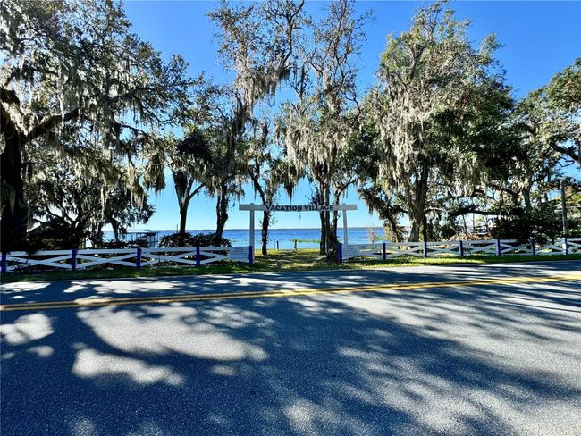 Vacation Village community private lakefront beach lot for your use | Image 52