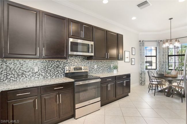 11521 Summerview Way, House other with 4 bedrooms, 3 bathrooms and null parking in Fort Myers FL | Image 2