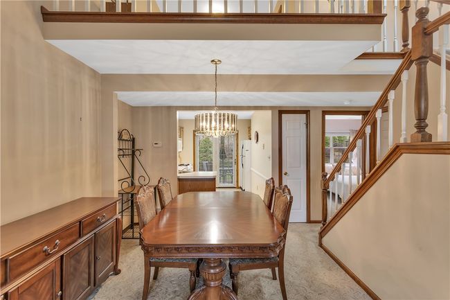 11x10 Dining Area Open to the Kitchen and Living Room with Space for a China Cupboard and Large Table. | Image 11