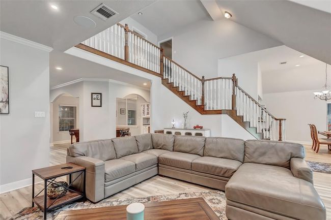 Living Room open to the breakfast area and upstairs with high ceilings and surround sound | Image 15