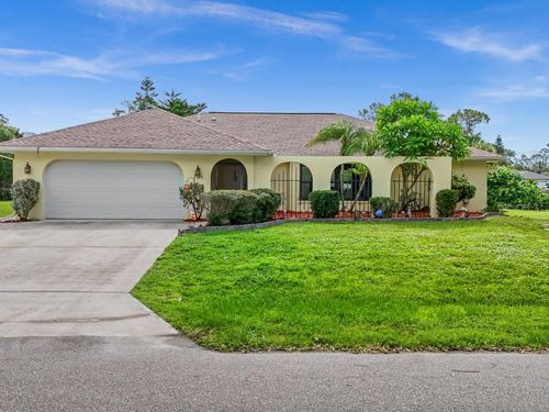 1386 Wilmette St, PORT CHARLOTTE, FL, 33980-1933 | Card Image