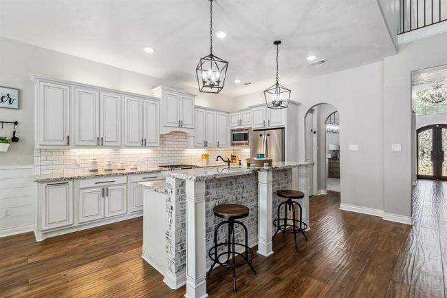 Your dream kitchen! The island features a breakfast bar with German schmear, the sink and the dishwasher. | Image 13