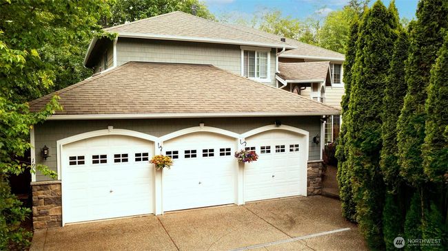 Long driveway to Entrance featuring 3 car garage! | Image 34