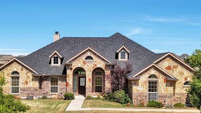 View of front of home with a front lawn | Image 1