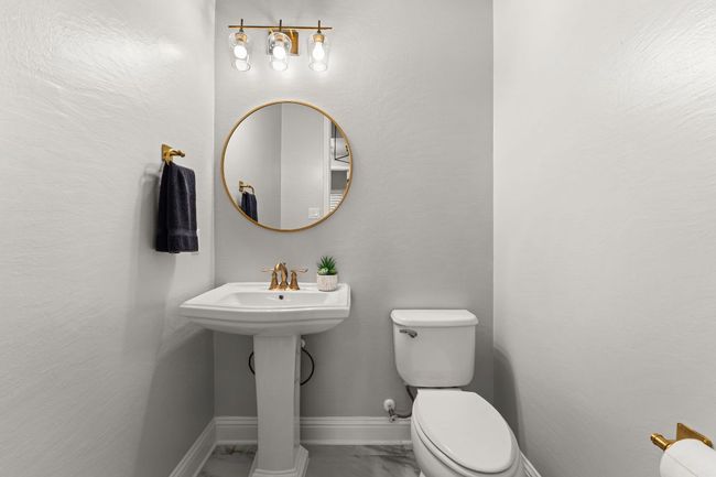 Downstairs powder bath. | Image 10