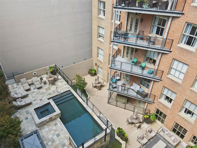 View of pool with a patio area and french doors | Image 26