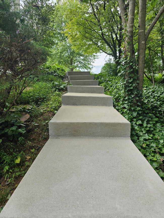Gorgeous walkway to front of home from the back yard. | Image 37