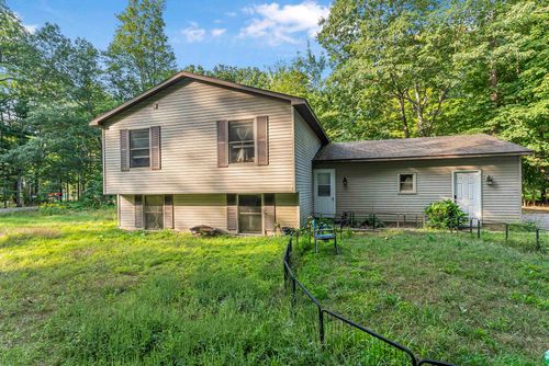 10583 Wildwood Rd, Interlochen, MI, 49643-9116 | Card Image