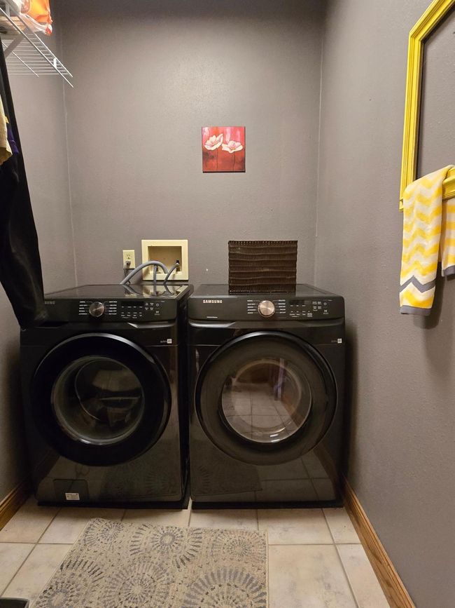 Main laundry combined with half bath | Image 19