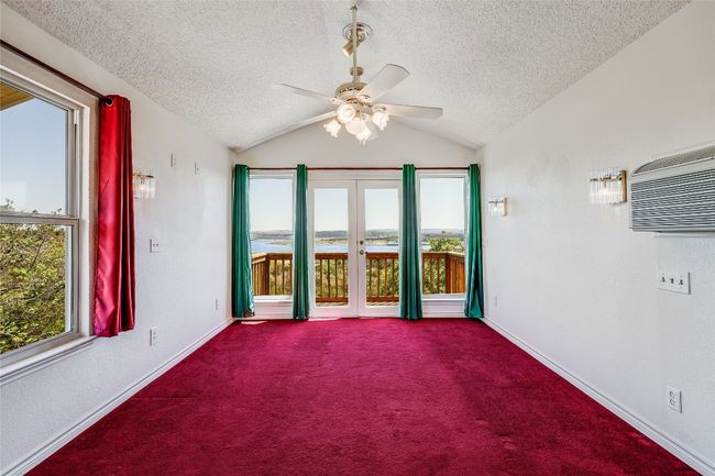 Across from the Kitchen, enjoy this living area, with sufficient windows and a balcony... | Image 20