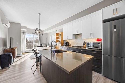 204-1521 26 Ave Sw, Calgary, AB, T2T1C4 | Card Image
