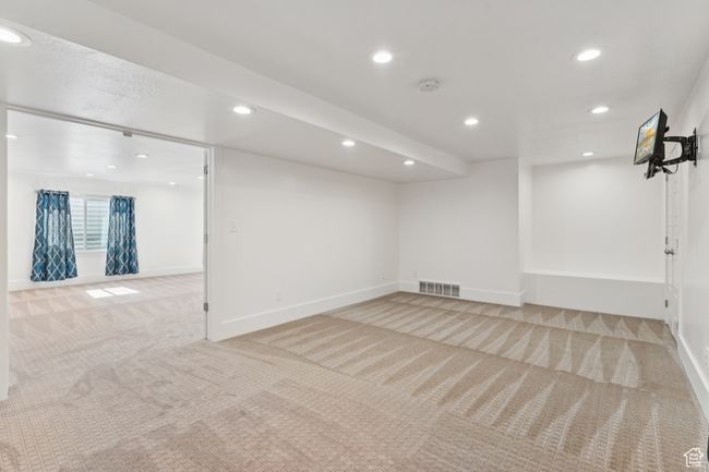 Basement with light colored carpet and recessed lighting | Image 25
