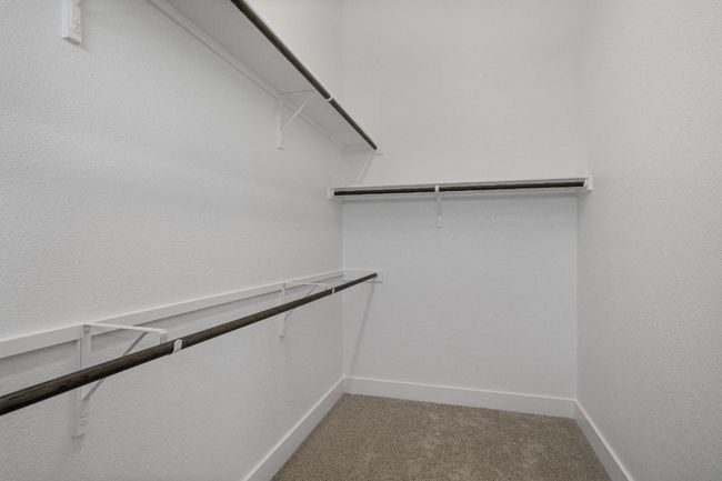 Walk-in closet in Primary Bedroom | Image 19