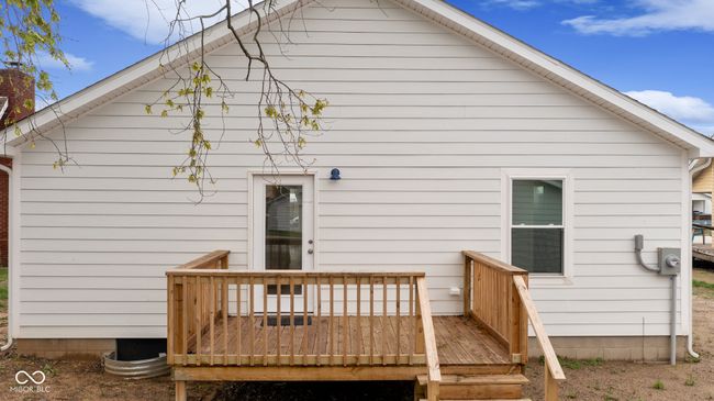 back of property with a deck | Image 11