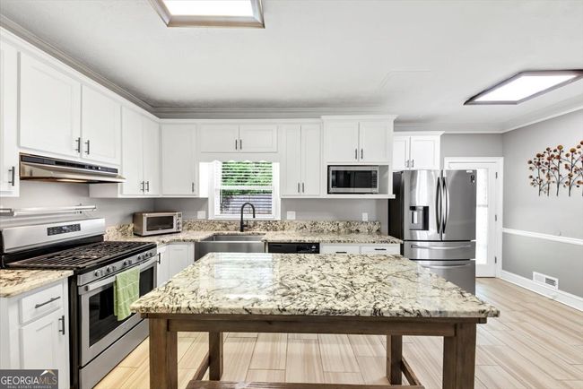 5045 Rock Springs Rd, House other with 4 bedrooms, 3 bathrooms and 2 parking in Lithonia GA | Image 14