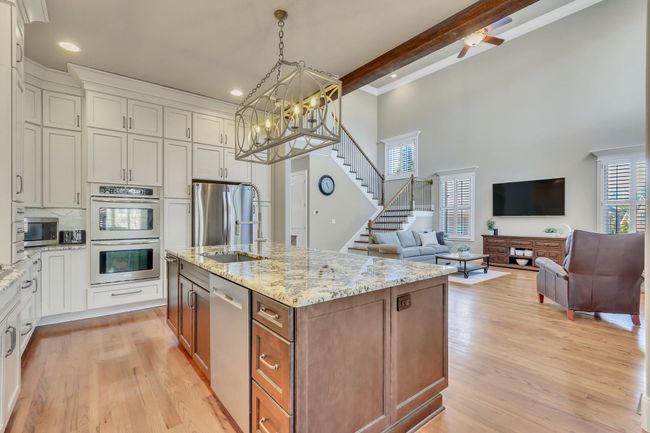 Oversized island open to Great Room so you never have to miss out when the game is on! | Image 20