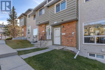 6915 Ranchview Dr Nw, Townhouse with 4 bedrooms, 3 bathrooms and 1 parking in Calgary AB | Image 2