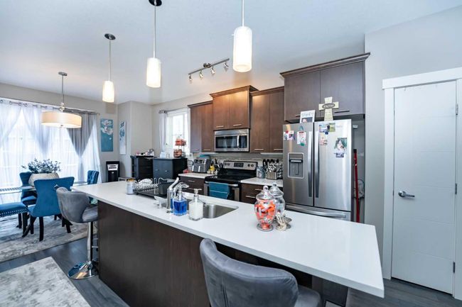 610 Redstone View Ne, Townhouse with 2 bedrooms, 3 bathrooms and 2 parking in Calgary AB | Image 13